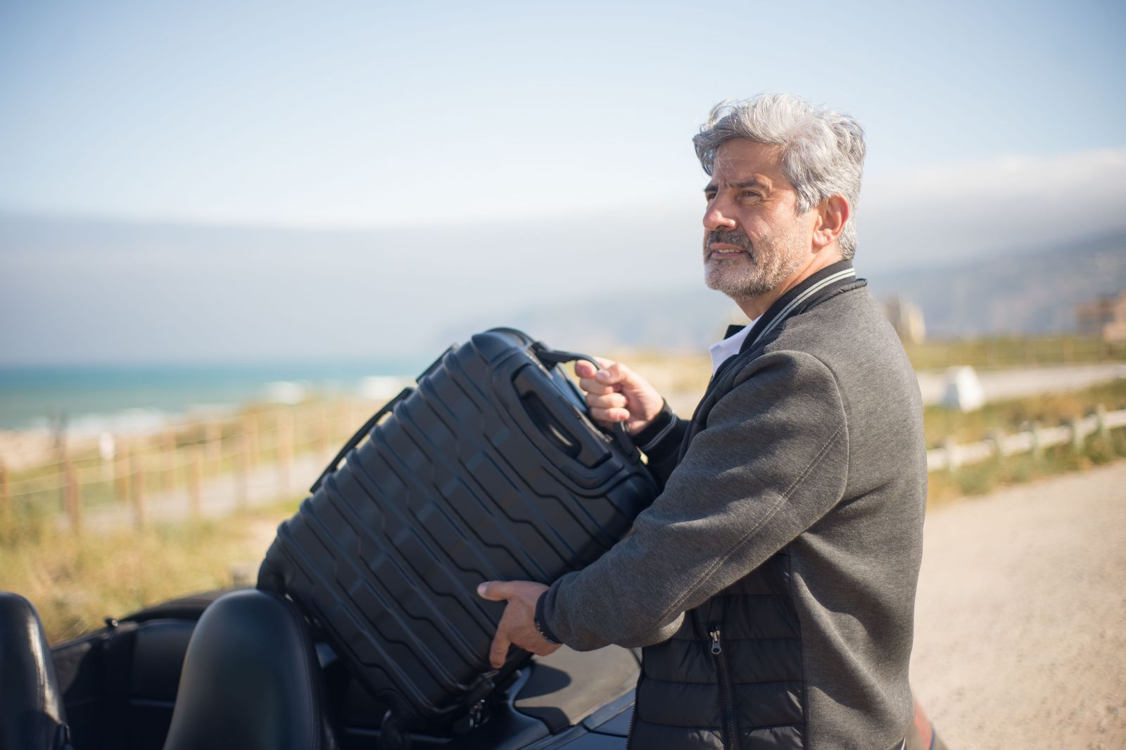 Luggage handled from the arrivals hall to the boot — part of the fare, not an extra