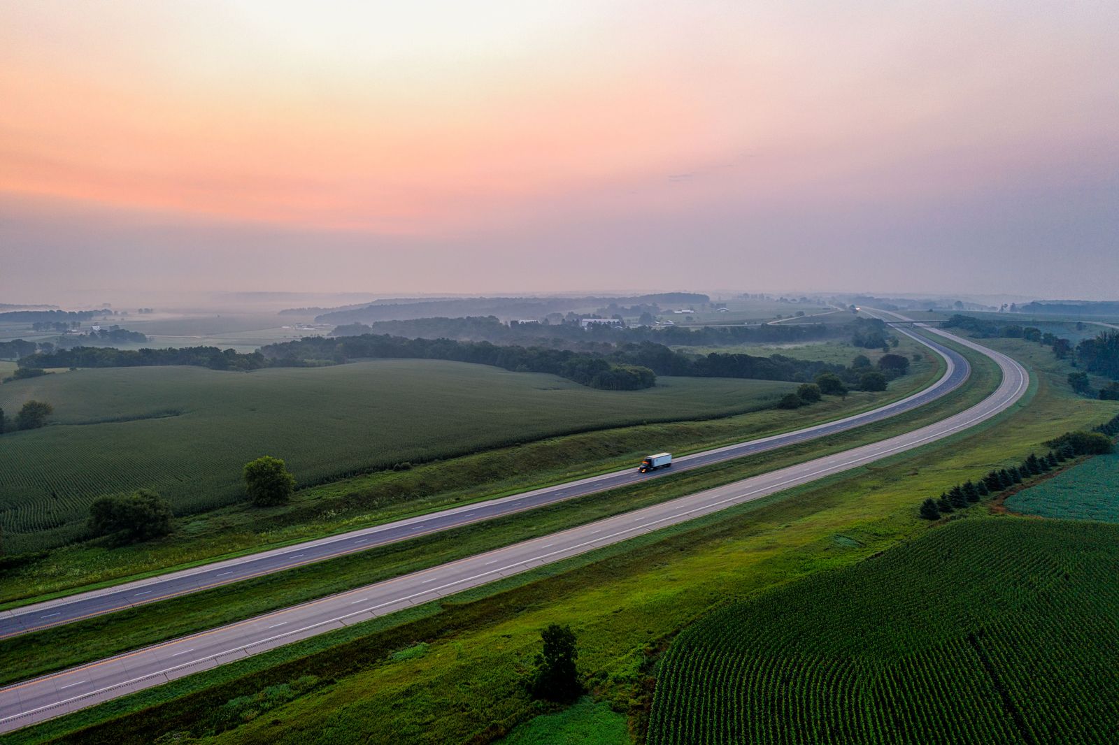 Southwestern Ontario farmland along the 401 — the first hour east from London